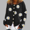 Daisy Black button-front cardigan featuring a daisy floral pattern, round neckline, long sleeves, ribbed cuffs, and relaxed silhouette