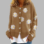 Daisy Brown button-front cardigan with an all-over daisy floral pattern, round neckline, long sleeves, ribbed trim, and relaxed fit