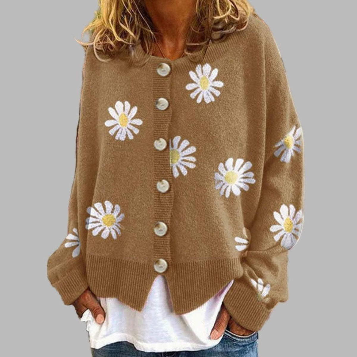 Daisy Brown button-front cardigan with an all-over daisy floral pattern, round neckline, long sleeves, ribbed trim, and relaxed fit
