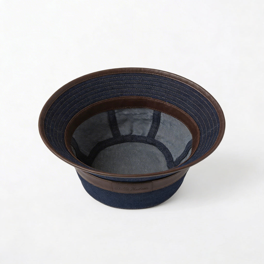 Interior view of dark blue denim bucket hat with leather band BELLA HUDSON