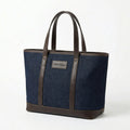 Dark blue denim tote bag with brown leather handles front view BELLA HUDSON