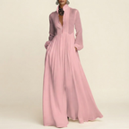 Front view of the Delphine Maxi Dress Linen Button-Front Long-Sleeve in Light Pink, featuring a classic button-front design, long sleeves, and a flowing maxi silhouette. Designed by Bella Hudson.