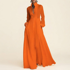 Front view of the Delphine Maxi Dress Linen Button-Front Long-Sleeve in Orange, featuring a classic button-front design, long sleeves, and a flowing maxi silhouette. Designed by Bella Hudson.