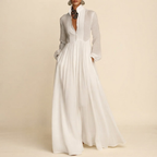 Front view of the Delphine Maxi Dress Linen Button-Front Long-Sleeve in White, featuring a button-front design, long sleeves, and a flowing maxi silhouette. Designed by Bella Hudson.