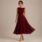 Denise Elegant Sleeveless Midi Dress with cowl neckline and pleated chiffon skirt in wine red front view. Designed by Bella Hudson.