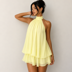Diana Chiffon Halter Mini Dress in Yellow with high halter neckline, layered chiffon skirt, and flowy mini silhouette, designed by BELLA HUDSON