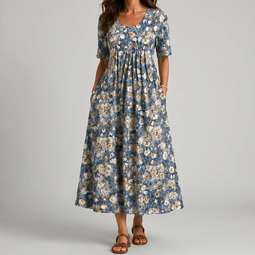Dusty blue floral maxi dress front view with short sleeves and pockets BELLA HUDSON