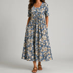 Dusty blue floral maxi dress front view with short sleeves and pockets BELLA HUDSON