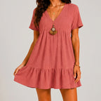 Front view of dusty rose tiered mini dress with V-neckline by BELLA HUDSON