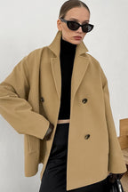 Elena Beige double-breasted boxy jacket with structured notched lapels, long sleeves, and a relaxed fit