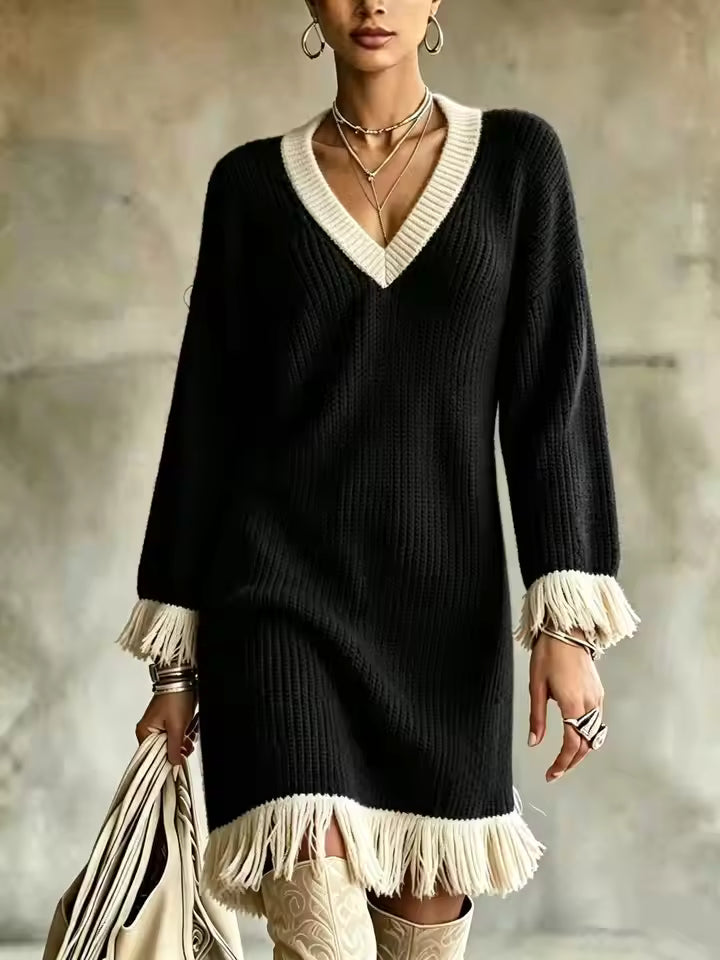 Elena Black ribbed knit sweater dress with contrasting V-neck trim, fringe cuffs, and relaxed silhouette