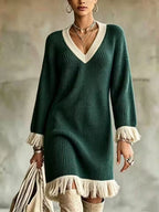Elena Dark Green V-neck sweater dress with ribbed knit texture, long sleeves, and decorative fringe trim