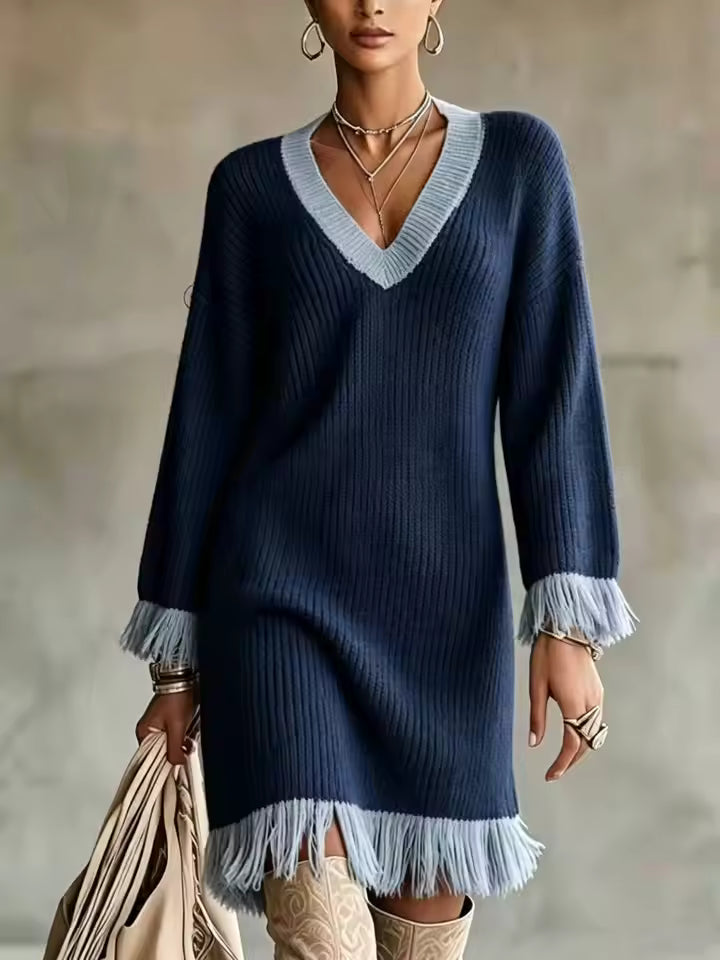 Elena Navy Blue ribbed knit sweater dress with contrasting V-neck trim, long sleeves, and fringed hem