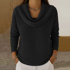 Elise Black waffle-knit sweater with a draped cowl neckline, long sleeves, and curved hem