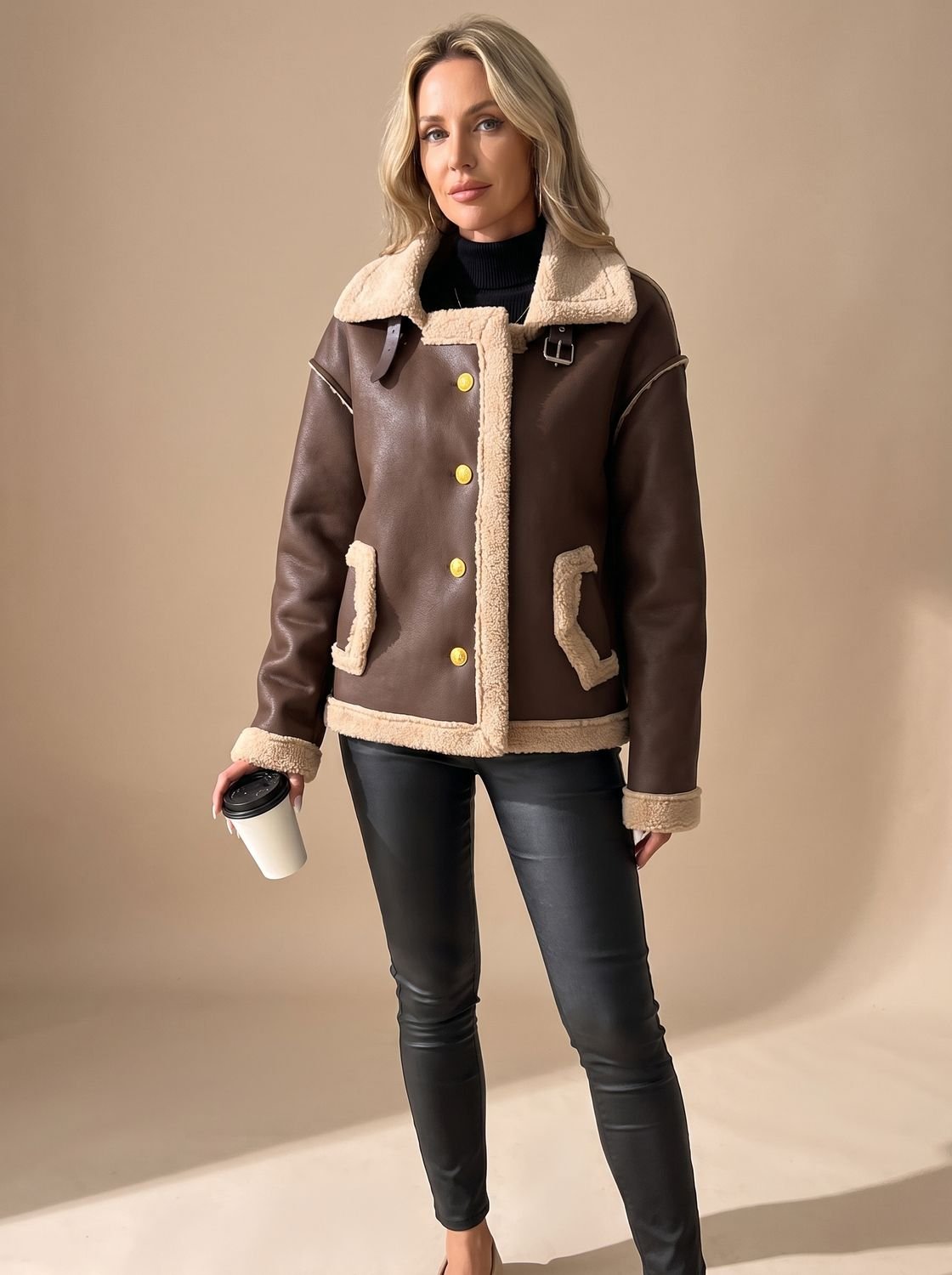 Elise Brown faux leather sherpa-trim jacket with wide buckled collar, button-front closure, long sleeves, and front patch pockets