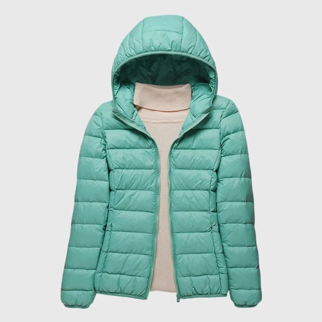 Elise Green hooded puffer jacket with horizontal quilted panels, zip-front closure, relaxed silhouette, and elasticated cuffs