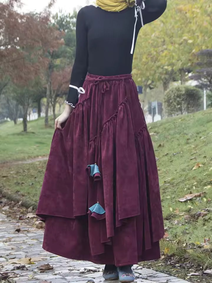 Elodie Burgundy corduroy maxi skirt with asymmetric layered hem