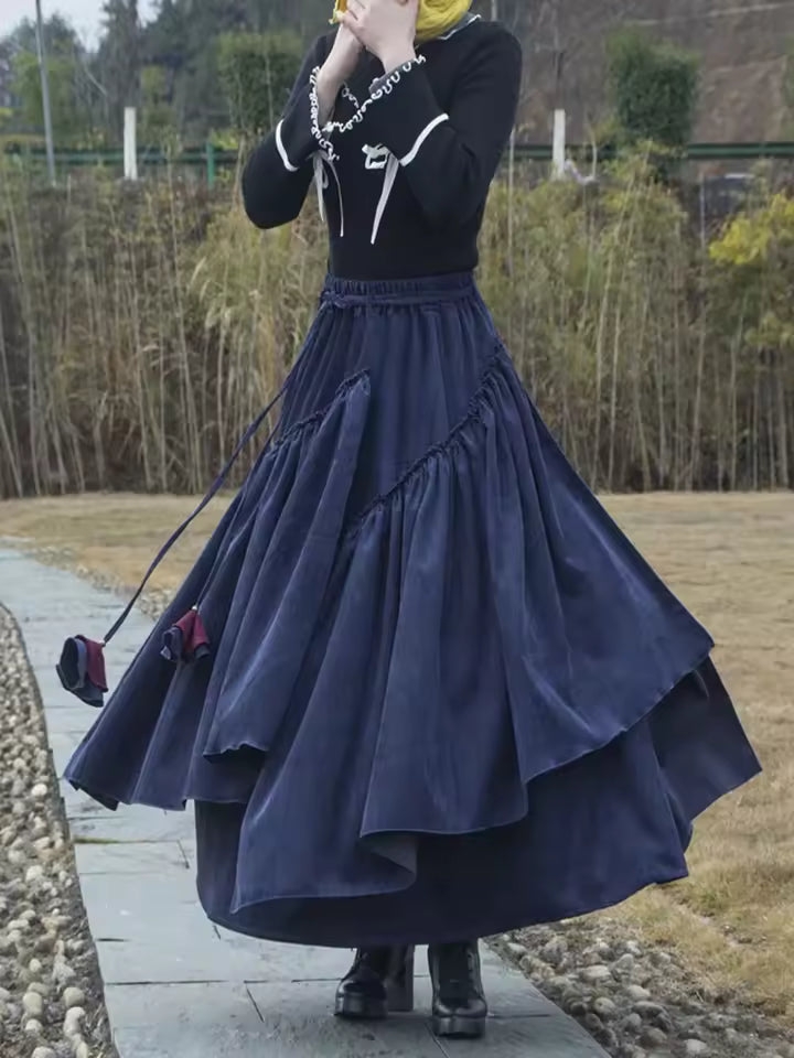 Elodie Navy corduroy maxi skirt with asymmetric tiers and flowing maxi length