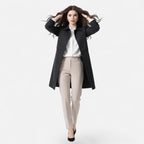 Open front view of the Emilia Trench Coat Midi Double-Breasted in black, featuring a pointed collar, long sleeves, double-breasted construction, and a straight midi-length silhouette. Designed by Bella Hudson.