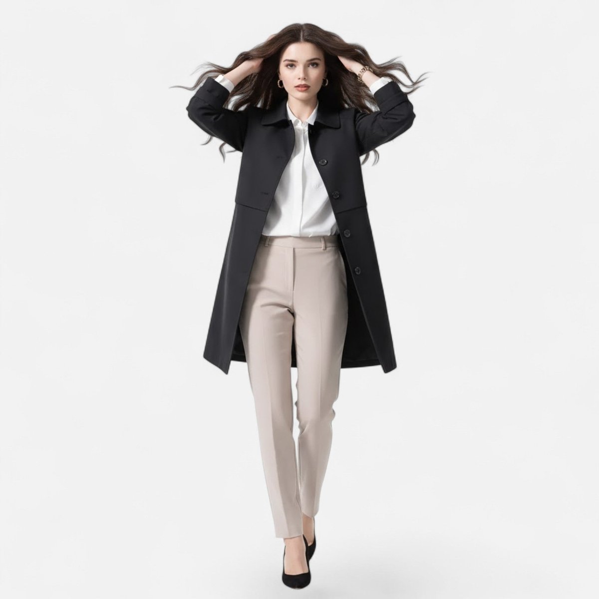 Open front view of the Emilia Trench Coat Midi Double-Breasted in black, featuring a pointed collar, long sleeves, double-breasted construction, and a straight midi-length silhouette. Designed by Bella Hudson.
