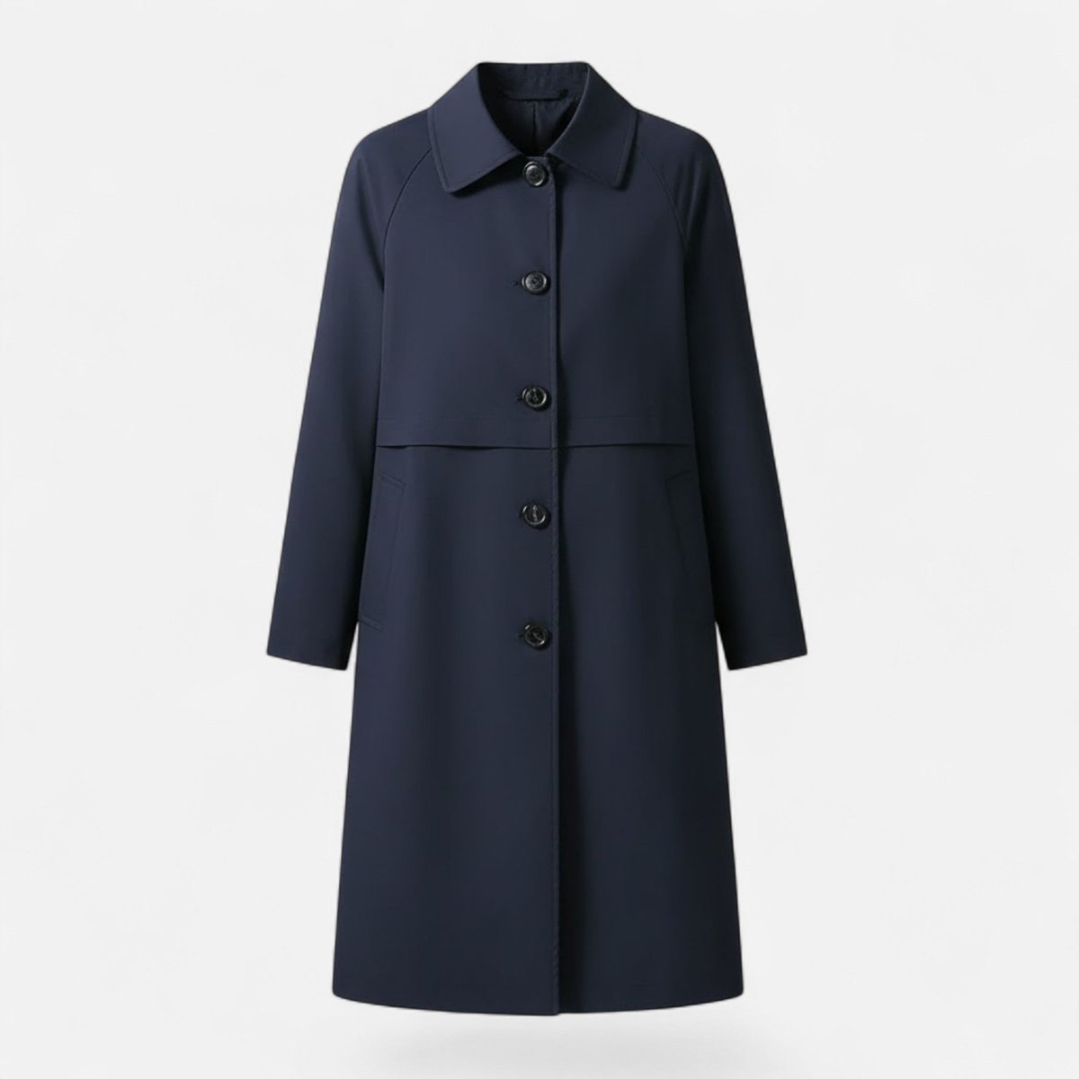 Front product view of the Emilia Trench Coat Midi Double-Breasted in navy blue, featuring a pointed collar, double-breasted button closure, long sleeves, side pockets, and a straight midi-length silhouette. Designed by Bella Hudson.