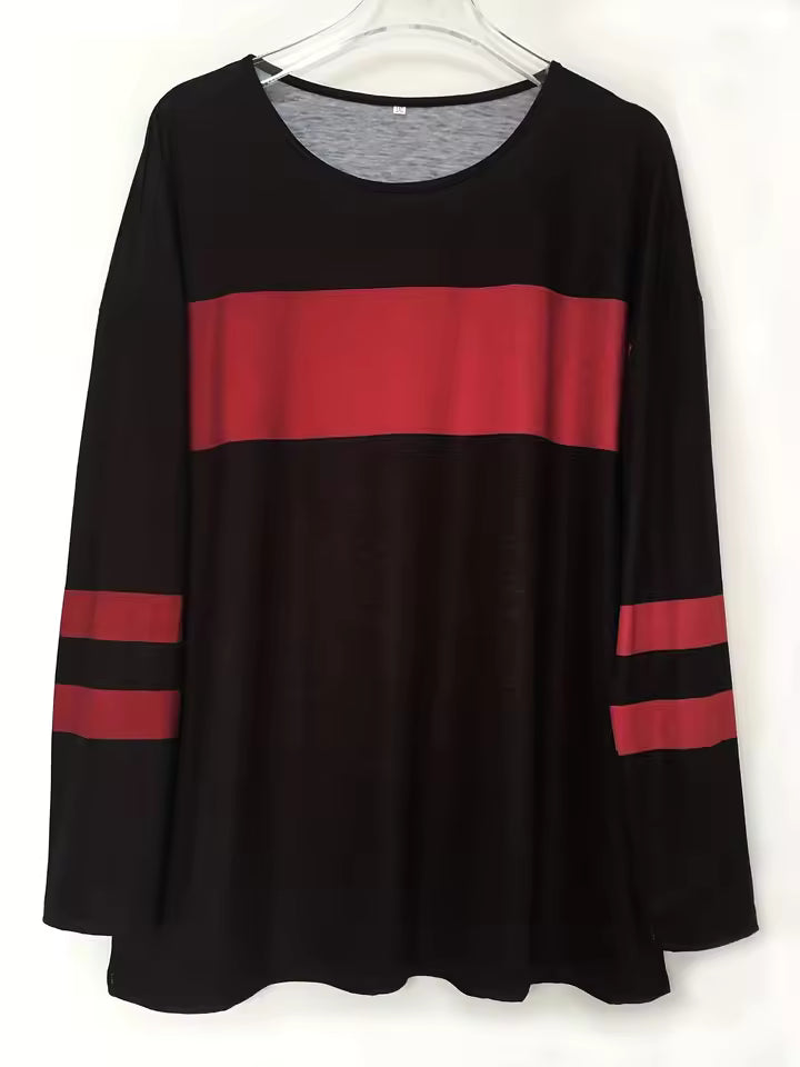 Emma Black long-sleeve tunic top with horizontal chest stripe, sleeve accents, and asymmetrical hem