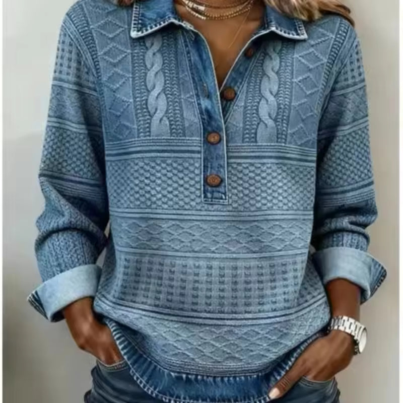 Emma Blue denim-inspired patchwork shirt with geometric knit-style texture, collared neckline, half-button placket, and rolled cuffs