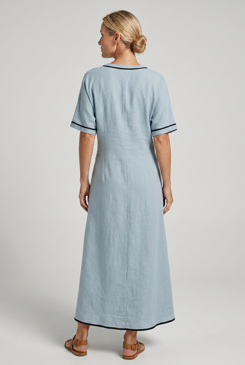 Back view of blue Emma Light Blue Maxi Dress with Elegant Twist-waist by BELLA HUDSON