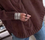 Esme Brown cable-knit sweater with braided front pattern, batwing sleeves, and relaxed fit