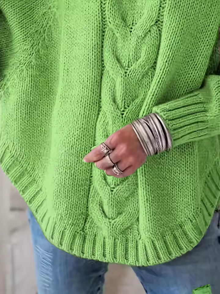 Esme Green cable-knit pullover sweater with textured braided pattern and ribbed hem