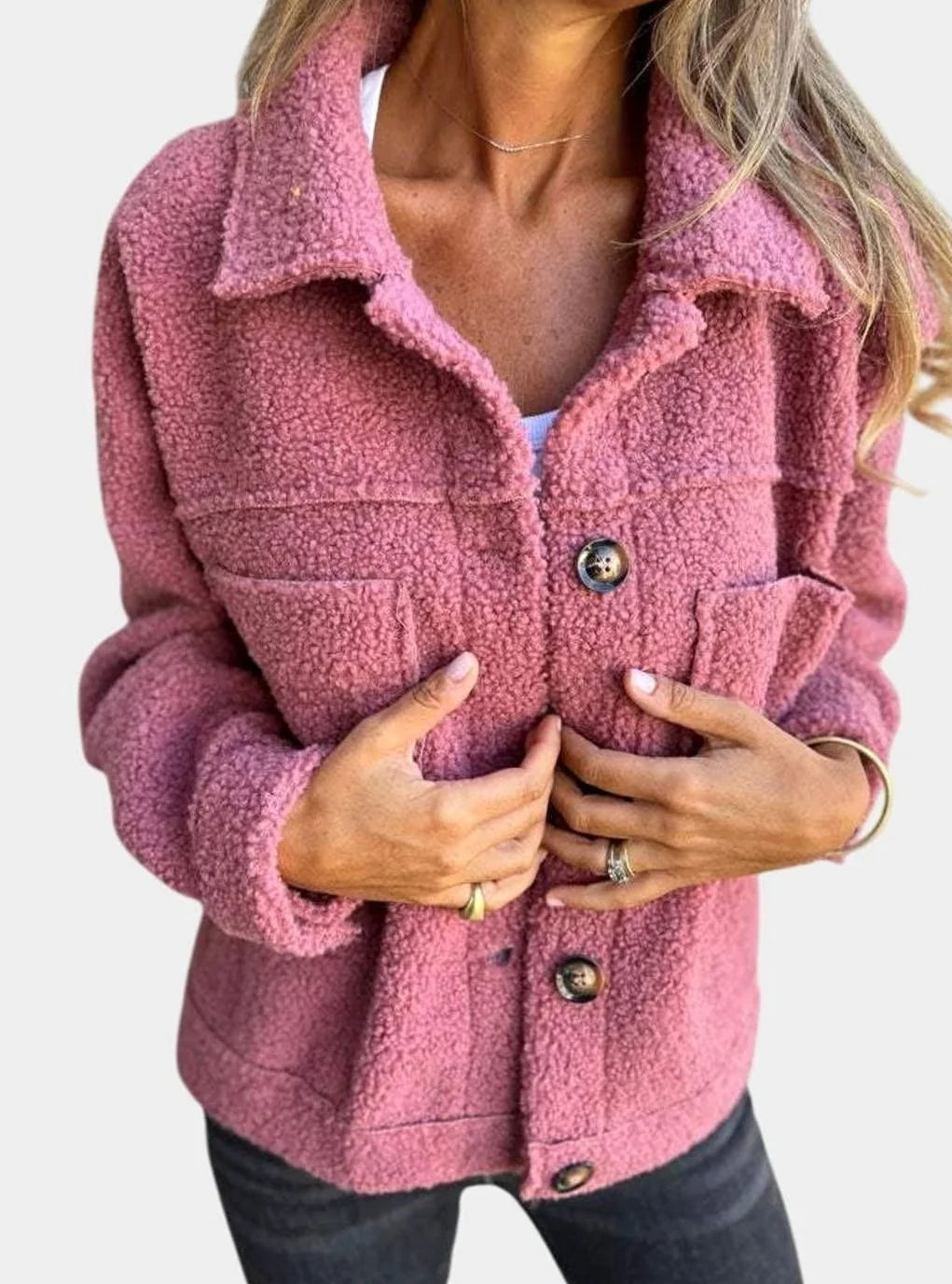 Evelyn Pink sherpa jacket with plush teddy-fleece texture, wide lapel collar, front buttons, long sleeves, and chest pockets