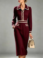 Evelyn Red collared midi dress with contrast piping, defined waist, long sleeves, and decorative pocket details