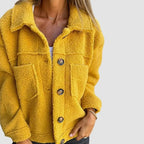 Evelyn Yellow teddy-fleece jacket featuring a wide lapel collar, button-front closure, relaxed fit, and front pockets