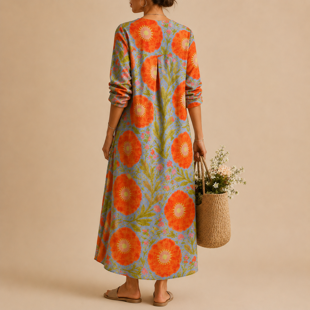 Faye Lightweight Layered Linen Midi Dress, back view featuring the flowing layered silhouette and relaxed everyday style. Designed by Bella Hudson.