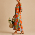Faye Lightweight Layered Linen Midi Dress, side view showcasing the flowing layered silhouette and breathable lightweight linen fabric. Designed by Bella Hudson.