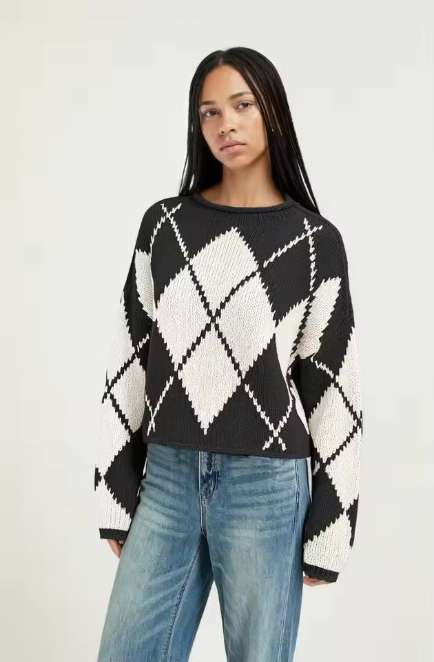 Fiona Black argyle knit sweater with contrasting diamond pattern, relaxed fit, and ribbed hem