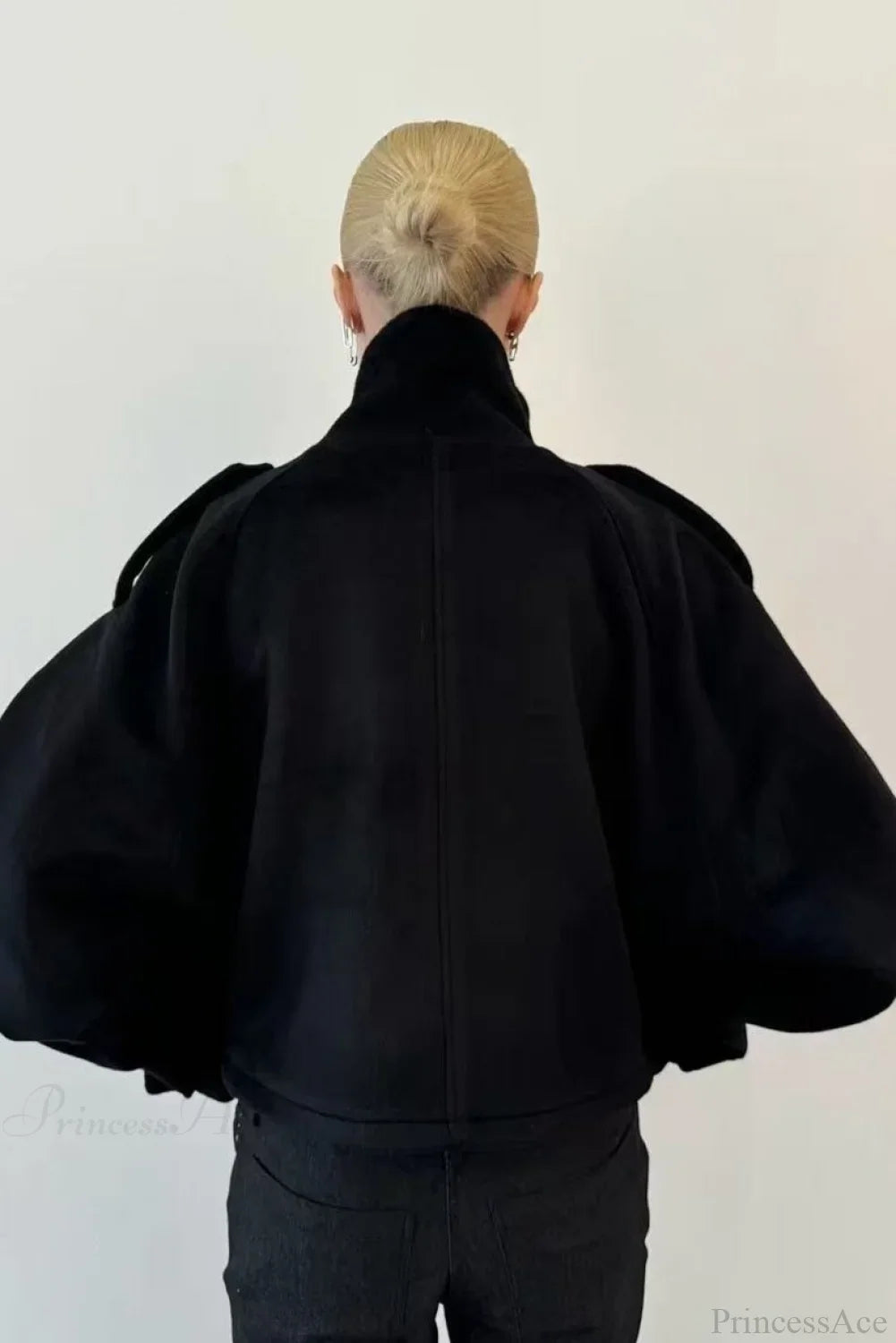 Fiona Black cropped jacket shown from the back with raglan sleeves and a center back seam.