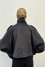 Fiona Gray cropped jacket shown from the back with wide raglan sleeves and a center back seam.