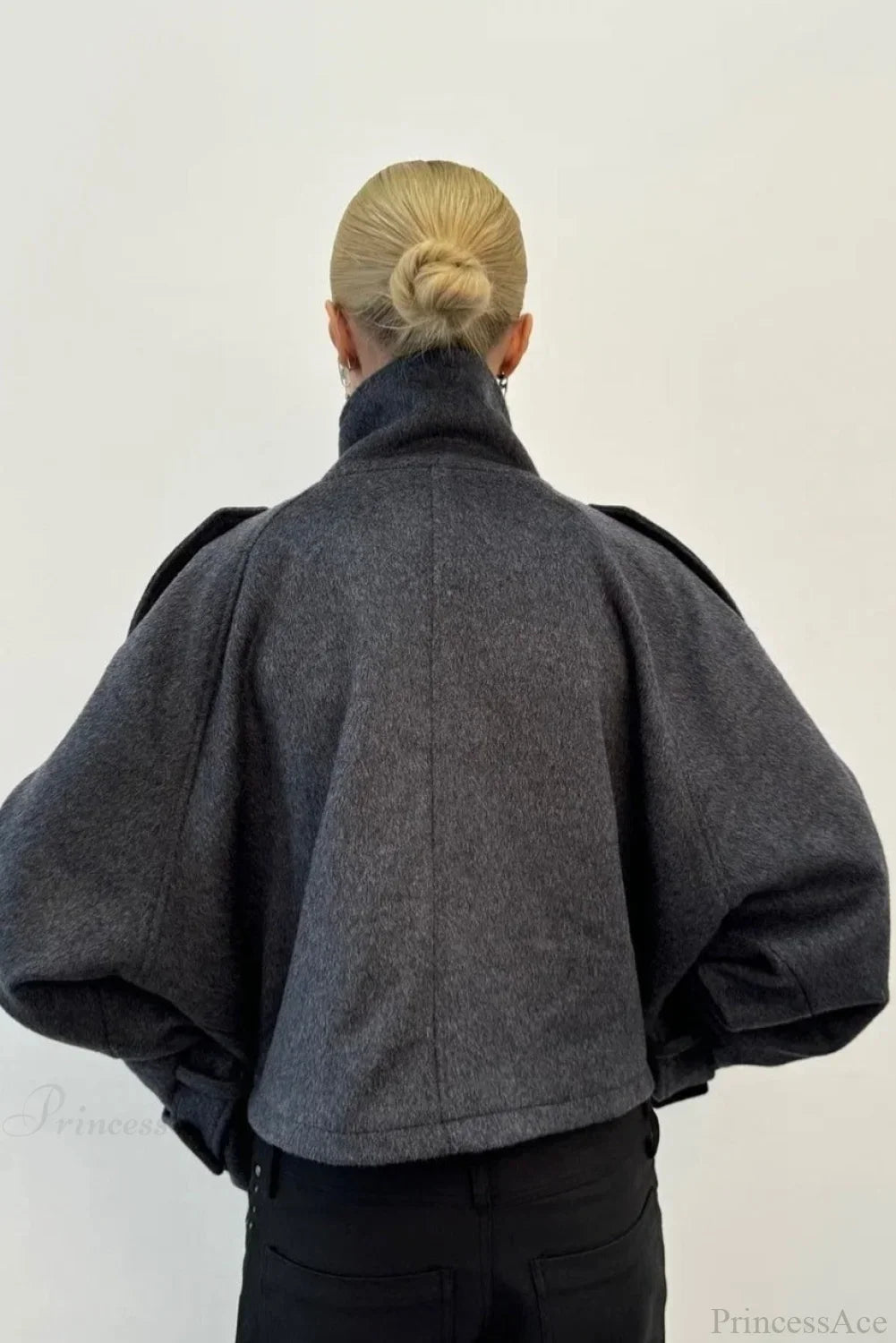 Fiona Gray cropped jacket shown from the back with wide raglan sleeves and a center back seam.