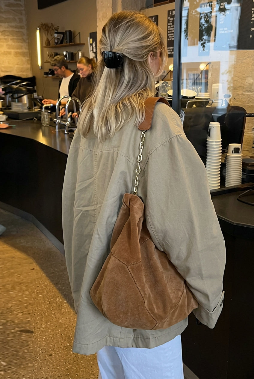 Fiona Khaki utility bomber jacket shown from the back with a relaxed oversized fit and long sleeves