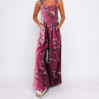Model wearing pink floral overalls casual jumpsuit with soft floral print BELLA HUDSON