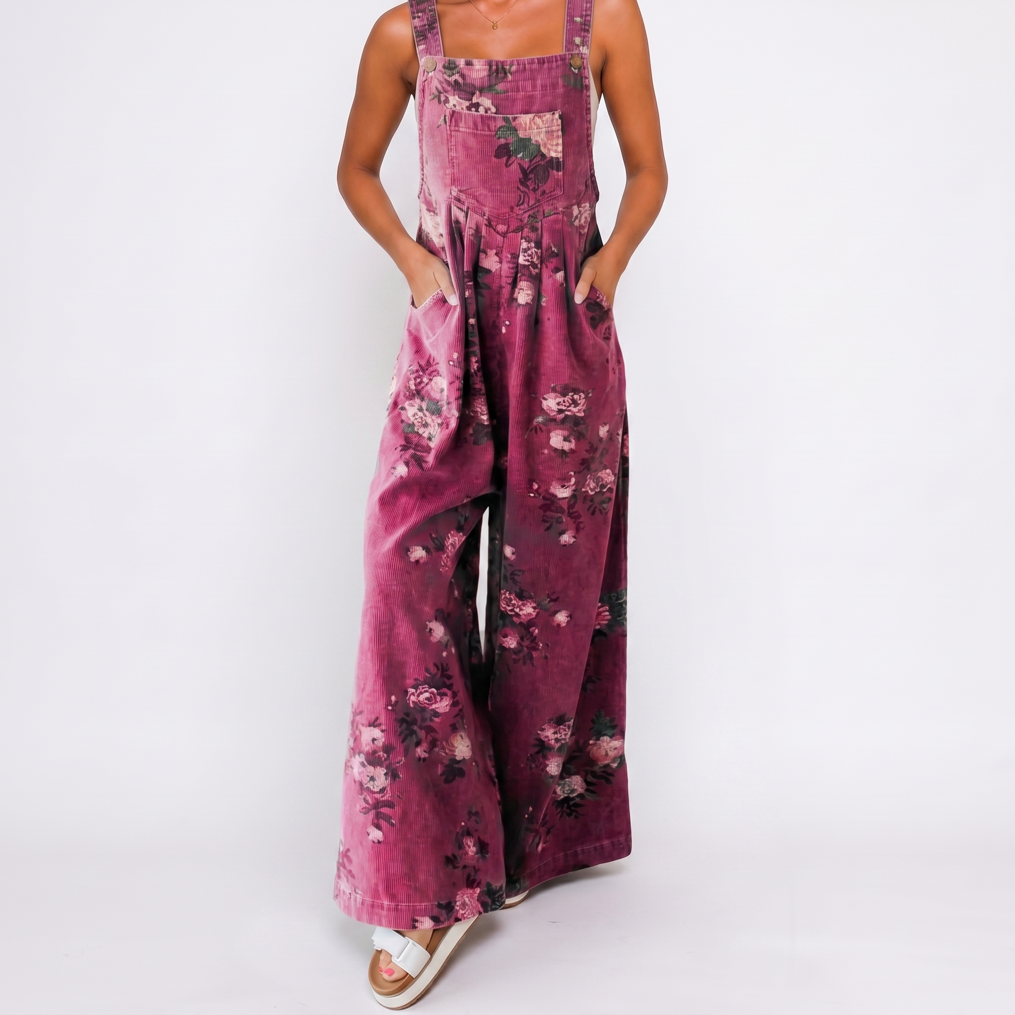 Model wearing pink floral overalls casual jumpsuit with soft floral print BELLA HUDSON