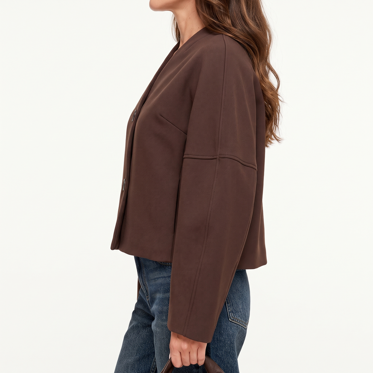 Freya Brown cropped V-neck jacket from the side, showing the rounded cocoon sleeve and button front.