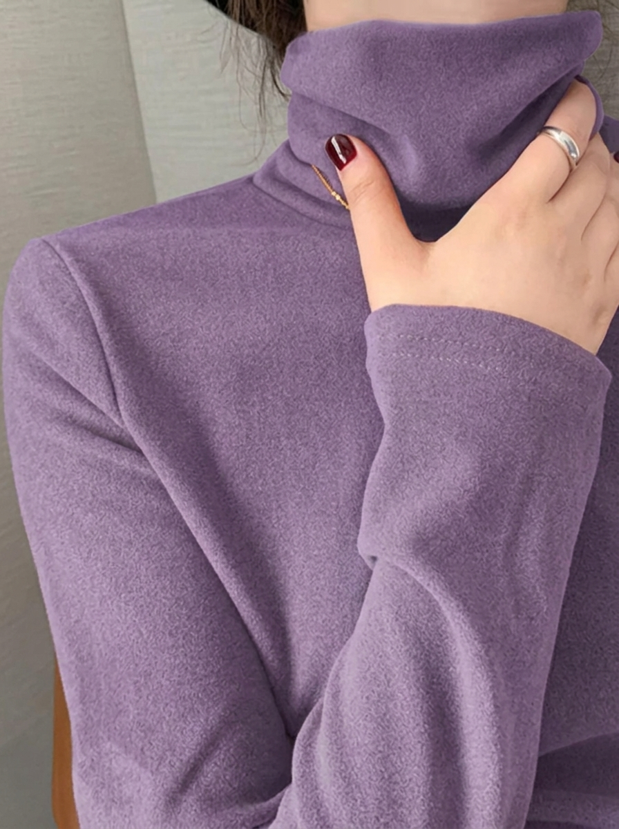 Freya Purple turtleneck top with a folded collar and soft fabric texture