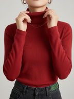 Freya Red turtleneck top with long sleeves and a folded high neckline
