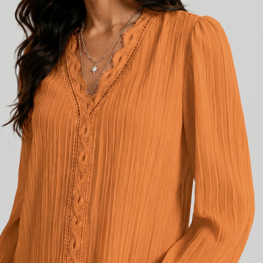 Close-up view of gold boho button blouse with long sleeves and textured fabric by BELLA HUDSON