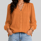 Front view of gold boho button blouse with long sleeves and textured fabric by BELLA HUDSON