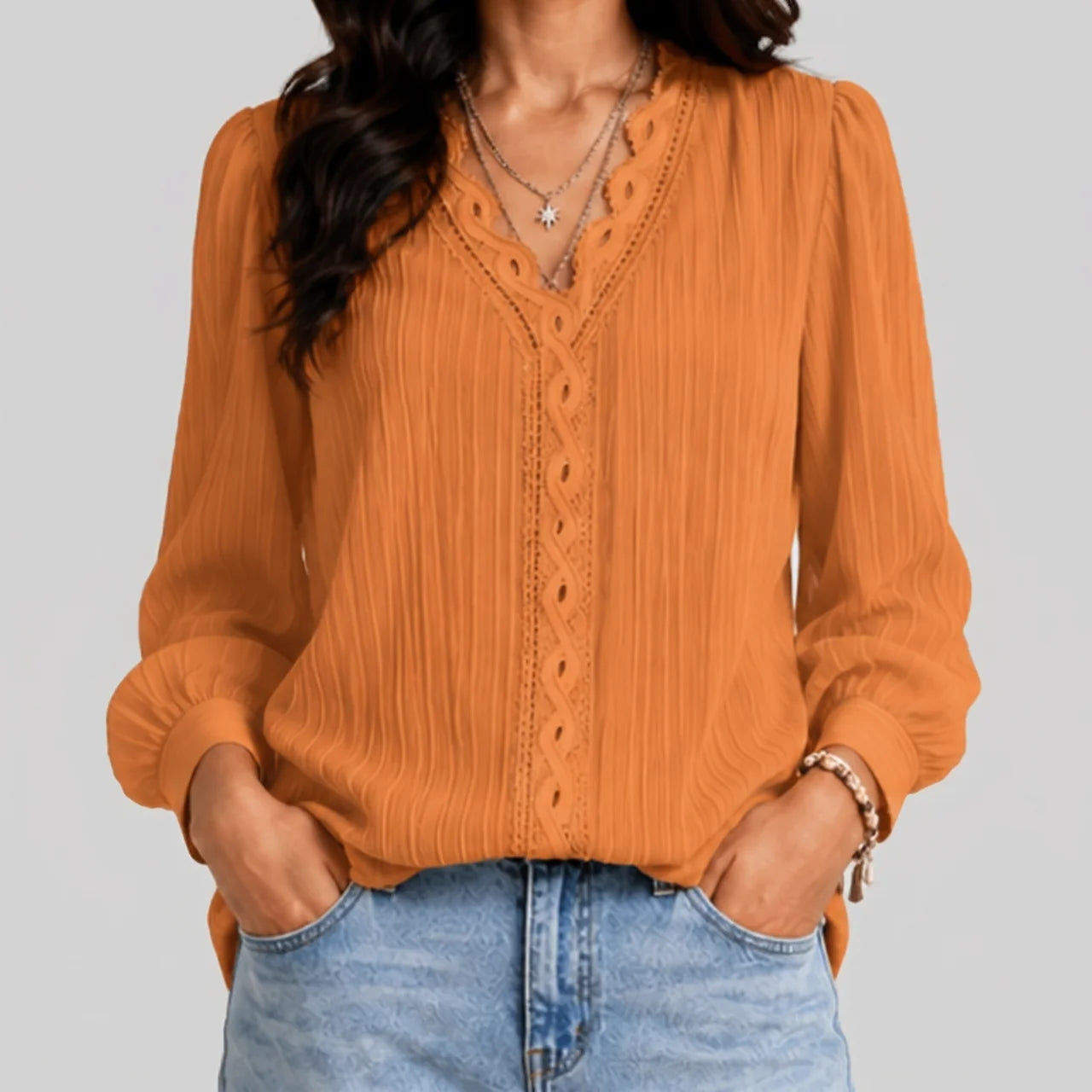 Front view of gold boho button blouse with long sleeves and textured fabric by BELLA HUDSON