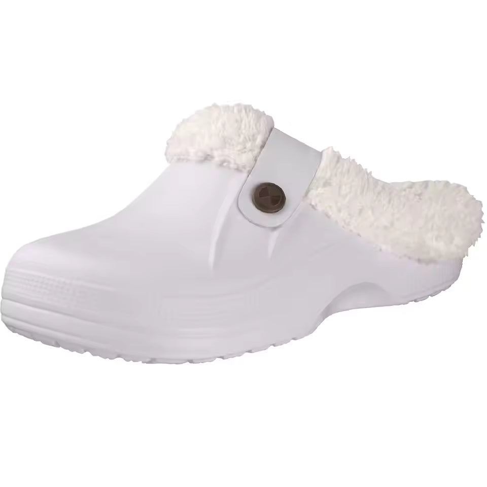 Grace White clog slippers with soft plush lining, rounded closed toe, side button detail, and slip-on design