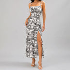 Front view of gray floral slit maxi dress with spaghetti straps and fitted silhouette by BELLA HUDSON